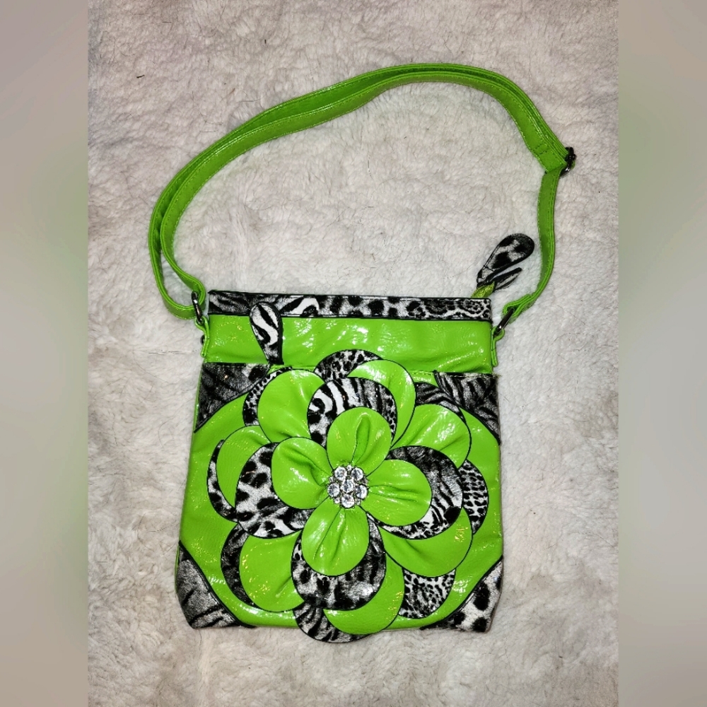 GREEN PURSE WITH ZEVRA AND FORAL PRINT